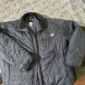 Grey north face jacket.